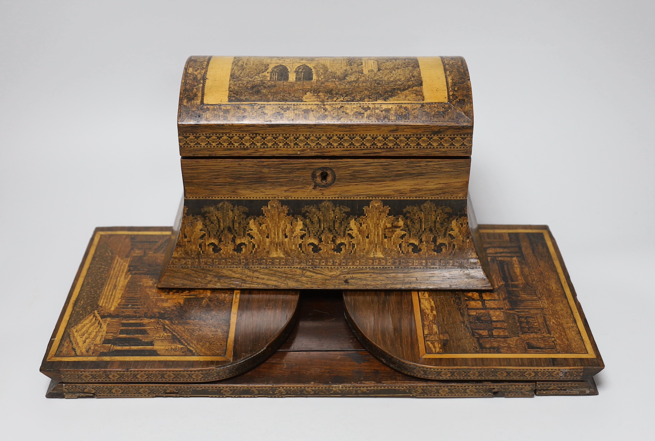 A 19th century Tunbridge ware rosewood tea caddy depicting Bayham Abbey ruins, and a bookslide with a rare view of the Pantiles and Shakespeare’s house, 39cm wide